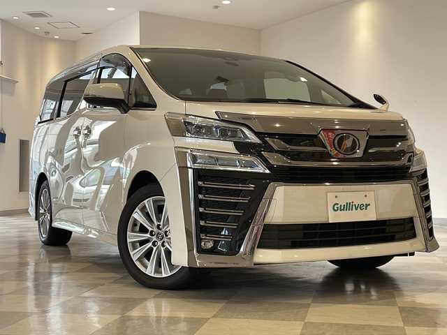 トヨタ ヴェルファイア Z Aエディション 福井県 2018(平30)年 5.5万km ホワイトパールクリスタルシャイン 純正9インチSDナビ/フルセグTV/バックカメラ/フリップダウンモニター/トヨタセーフティーセンス/・レーダークルーズコントロール/・レーンディパーチャーアラート/・クリアランスソナー/・プリクラッシュセーフティー/・ロードサインアイシスト/・オートマチックハイビーム/ETC/ドライブレコーダー/LEDヘッドライト/オートライト/革巻きステアリング/ステアリングスイッチ/オットマン/純正フロアマット/プッシュスタート/スマートキー