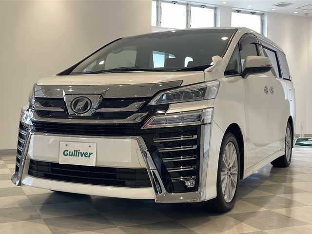 トヨタ ヴェルファイア Z Aエディション 福井県 2018(平30)年 5.5万km ホワイトパールクリスタルシャイン 純正9インチSDナビ/フルセグTV/バックカメラ/フリップダウンモニター/トヨタセーフティーセンス/・レーダークルーズコントロール/・レーンディパーチャーアラート/・クリアランスソナー/・プリクラッシュセーフティー/・ロードサインアイシスト/・オートマチックハイビーム/ETC/ドライブレコーダー/LEDヘッドライト/オートライト/革巻きステアリング/ステアリングスイッチ/オットマン/純正フロアマット/プッシュスタート/スマートキー