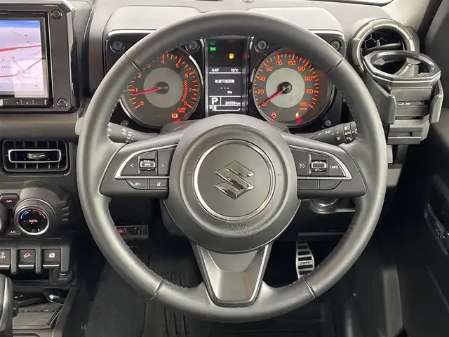 スズキ ジムニー シエラ JC 茨城県 2023(令5)年 2.7万km ピュアホワイトP 社外８型ナビ（ＢＴ，フルセグＴＶ）　/前後ドラレコ　/ＥＴＣ　/コーナーセンサー　/クルーズコントロール　/衝突被害軽減ブレーキ　/レーンキープ　/ヒルディセントコントロール　/シートヒーター　/ルーフキャリア　/ＬＥＤ