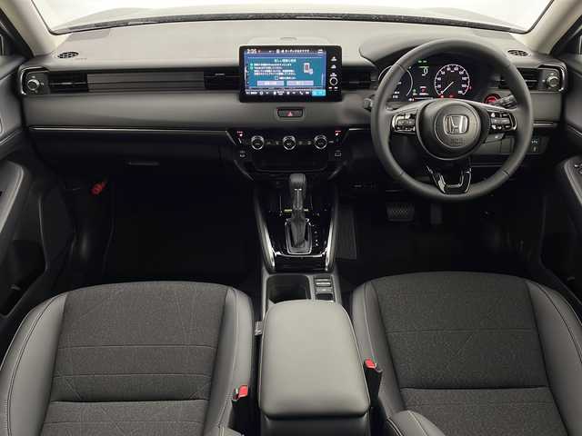 ホンダ ヴェゼル ハイブリッド e:HEV Z 鹿児島県 2025(令7)年 0.1千km クリスタルブラックパール 登録済未使用車/ホンダセンシング/純正ディスプレイオーディオ/(BT/Applecarplay/Androidauto/AM/FM/フルセグTV)/パドルシフト/レーダークルーズコントロール/レーンキープアシスト/純正ビルトインETC2.0/チップアップシート/ハーフレザーシート/前席シートヒーター/電動パワーバックドア/純正18インチアルミホイール/前後コーナーセンサー/オートマチックハイビーム/純正LEDヘッドライト/ブラインドスポットモニター/取扱説明書/保証書