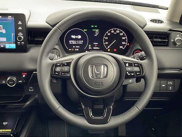 ホンダ ヴェゼル ハイブリッド e:HEV Z 鹿児島県 2025(令7)年 0.1千km クリスタルブラックパール 登録済未使用車/ホンダセンシング/純正ディスプレイオーディオ/(BT/Applecarplay/Androidauto/AM/FM/フルセグTV)/パドルシフト/レーダークルーズコントロール/レーンキープアシスト/純正ビルトインETC2.0/チップアップシート/ハーフレザーシート/前席シートヒーター/電動パワーバックドア/純正18インチアルミホイール/前後コーナーセンサー/オートマチックハイビーム/純正LEDヘッドライト/ブラインドスポットモニター/取扱説明書/保証書