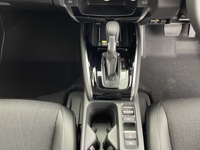 ホンダ ヴェゼル ハイブリッド e:HEV Z 鹿児島県 2025(令7)年 0.1千km クリスタルブラックパール 登録済未使用車/ホンダセンシング/純正ディスプレイオーディオ/(BT/Applecarplay/Androidauto/AM/FM/フルセグTV)/パドルシフト/レーダークルーズコントロール/レーンキープアシスト/純正ビルトインETC2.0/チップアップシート/ハーフレザーシート/前席シートヒーター/電動パワーバックドア/純正18インチアルミホイール/前後コーナーセンサー/オートマチックハイビーム/純正LEDヘッドライト/ブラインドスポットモニター/取扱説明書/保証書