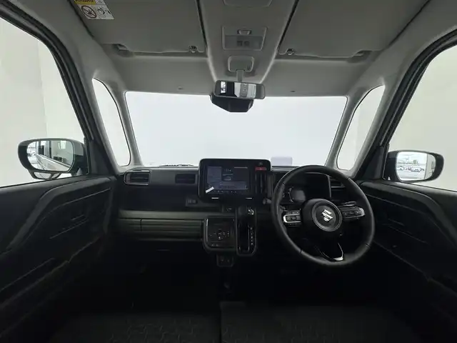 スズキ スペーシア ギア HYBRID XZターボ 愛知県 2024(令6)年 0.5万km ココナッツベージュメタリック スズキ純正メモリーナビゲーション/　　・9インチHDディスプレイ/　　・フルセグTV・AM/FMラジオ/　　・スマートフォン連携機能付/　　・Bluetooth(R)対応/　　・スズキコネクト対応通信機/全方位モニター用カメラ［フロント/サイド（左右）/バックカメラ］USBソケット/ステアリングリモコン/パドルシフト/MTモード/ステアリングヒーター/スリムサーキュレーター/ベンチシート/シートヒーター/オットマン/フルフラットシート/スズキセーフティサポート/　　・HUD/　　・衝突軽減システム/　　・横滑り防止機能/　　・レーンキープアシスト/　　・アダクティブクルーズコントロール/取扱説明書/保証書/ワンオーナー/スマートキー/スペアキー