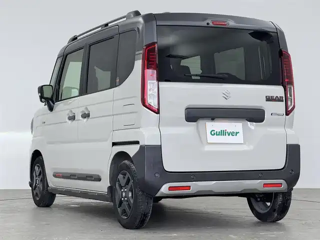 スズキ スペーシア ギア HYBRID XZターボ 愛知県 2024(令6)年 0.5万km ココナッツベージュメタリック スズキ純正メモリーナビゲーション/　　・9インチHDディスプレイ/　　・フルセグTV・AM/FMラジオ/　　・スマートフォン連携機能付/　　・Bluetooth(R)対応/　　・スズキコネクト対応通信機/全方位モニター用カメラ［フロント/サイド（左右）/バックカメラ］USBソケット/ステアリングリモコン/パドルシフト/MTモード/ステアリングヒーター/スリムサーキュレーター/ベンチシート/シートヒーター/オットマン/フルフラットシート/スズキセーフティサポート/　　・HUD/　　・衝突軽減システム/　　・横滑り防止機能/　　・レーンキープアシスト/　　・アダクティブクルーズコントロール/取扱説明書/保証書/ワンオーナー/スマートキー/スペアキー