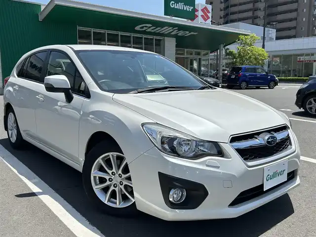 スバル インプレッサ スポーツ 2．0i アイサイト 島根県 2014(平26)年 4.4万km サテンホワイトパール 純正ＳＤナビ　/フルセグＴＶ　/ＤＶＤ／ＣＤ再生　/Ｂｌｕｅｔｏｏｔｈ接続　/ＥＴＣ　/４ＷＤ　/衝突軽減ブレーキ　/アイドリングストップ　/レーンアシスト　/横滑り防止装置/アダプティブクルーズコントロール/ＨＩＤヘッドライト/パドルシフト/キーレス/スペアキー×１　/純正１６インチアルミホイール　/純正フロアマット