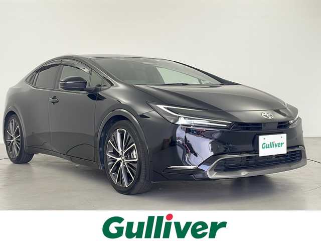 トヨタ プリウス Z 岐阜県 2023(令5)年 2.4万km アティチュードブラックマイカ 12.3インチディスプレイオーディオ/・AM/FM/・フルセグテレビ/・Bluetooth/・USB/・Miracast/トヨタセーフティセンス/・プリクラッシュセーフティ/・フロントクロストラフィックアラート（FCTA）/・レーンチェンジアシスト/・レーンディパーチャーアラート（LDA）/・レーダークルーズコントロール/・オートマチックハイビーム（AHB）/・ロードサインアシスト（RSA）/パノラマルーフ/レザーシート/・シートヒーター/・シートベンチレーション/デジタルインナーミラー/パノラミックビューモニター/革巻きステアリング/・ステアリングスイッチ/・ステアリングイーター/ワイヤレス充電/AC100Vコンセント