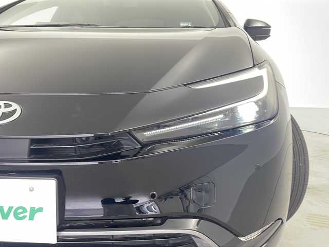 トヨタ プリウス Z 岐阜県 2023(令5)年 2.4万km アティチュードブラックマイカ 12.3インチディスプレイオーディオ/・AM/FM/・フルセグテレビ/・Bluetooth/・USB/・Miracast/トヨタセーフティセンス/・プリクラッシュセーフティ/・フロントクロストラフィックアラート（FCTA）/・レーンチェンジアシスト/・レーンディパーチャーアラート（LDA）/・レーダークルーズコントロール/・オートマチックハイビーム（AHB）/・ロードサインアシスト（RSA）/パノラマルーフ/レザーシート/・シートヒーター/・シートベンチレーション/デジタルインナーミラー/パノラミックビューモニター/革巻きステアリング/・ステアリングスイッチ/・ステアリングイーター/ワイヤレス充電/AC100Vコンセント
