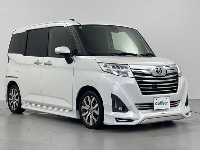 トヨタ ルーミー カスタムG－T 岐阜県 2016(平28)年 6万km パールホワイトⅢ モデリスタエアロ/純正9インチナビ/（BT/フルセグ/CD/DVD）/衝突軽減ブレーキ/クルーズコントロール/バックカメラ/後方クリアランスソナー/両側パワースライドドア/ETC/シートヒーター（運転席/助手席）/スマートキー/プッシュスタート/革ステアリング/ステアリングスイッチ/フォグランプ/LEDヘッドライト/オートライト/電動格納ミラー/アイドリングストップ