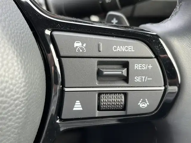 ホンダ ステップワゴン スパーダ eHEV 奈良県 2023(令5)年 1.4万km プラチナホワイトパール 純正９インチナビ　/フルセグＴＶ　/フリップダウンモニター　/BT/CD/DVD/SD/両側パワースライドドア　/追従型クルーズコントロール　/バックカメラ　/ビルトインＥＴＣ　/ハーフレザーシート　/シートヒーター　/前後コーナーセンサー/ターボ付き/スマートキー/純正16インチアルミホイール/純正フロアマット/衝突被害軽減システム/LEDヘッドライト