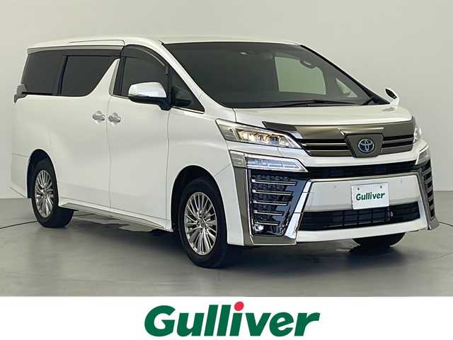 トヨタ ヴェルファイア ハイブリット ゴールデンアイズⅢ 岐阜県 2022(令4)年 2.4万km ホワイトパールクリスタルシャイン 純正ナビ　バックカメラ　フリップダウンモニタ　トヨタセーフティセンス　ブラインドスポットモニター　デジタルインナーミラー　埋込型ＥＴＣ　電動リアゲート　両側パワースライドドア　１００Ｖ充電　オットマン