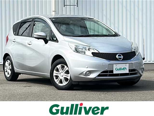日産 ノート X DIG－S 愛媛県 2015(平27)年 5.7万km ブリリアントシルバー 純正SDナビ/Bluetooth/ワンセグ/SD/CD/DVD/ETC/社外ドライブレコーダー前後/バックカメラ/アラウンドビューモニター/純正フロアマット/コーナーセンサー/社外LEDヘッドライト/オートライト/レーンキープアシスト/衝突被害軽減システム/アイドリングストップ/プッシュスタート/保証書/取扱説明書