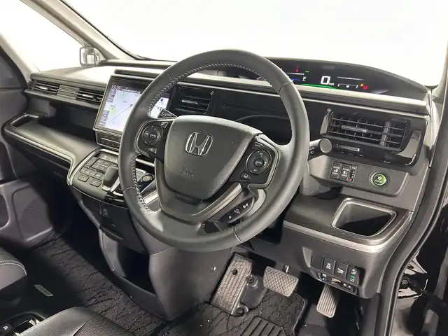 ホンダ ステップワゴン スパーダ ハイブリッド G EX ホンダセンシング 佐賀県 2018(平30)年 3.9万km プレミアムスパークルブラックパール 純正10インチナビ/フルセグTV/CD/DVD/Bluetooth/バックカメラ/衝突被害軽減システム/レーダークルーズコントロール/レーンアシスト/横滑り防止装置/ロードサインアシスト/先行車発進お知らせ機能/オートライト/LEDヘッドライト/フォグライト/ビルトインETC/電子パーキング/ブレーキホールド/両側パワースライドドア/ハーフレザーシート/運転席・助手席シートヒーター/後席サンシェード/シートバックテーブル/ISOFIX対応シート/純正フロアマット/純正16インチアルミホイール