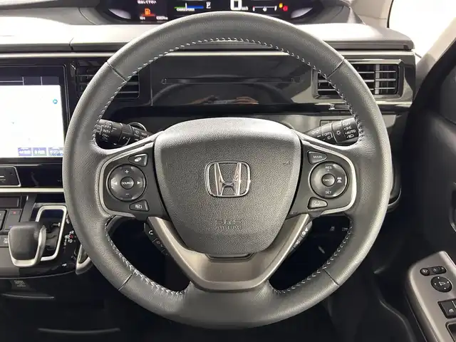 ホンダ ステップワゴン スパーダ ハイブリッド G EX ホンダセンシング 佐賀県 2018(平30)年 3.9万km プレミアムスパークルブラックパール 純正10インチナビ/フルセグTV/CD/DVD/Bluetooth/バックカメラ/衝突被害軽減システム/レーダークルーズコントロール/レーンアシスト/横滑り防止装置/ロードサインアシスト/先行車発進お知らせ機能/オートライト/LEDヘッドライト/フォグライト/ビルトインETC/電子パーキング/ブレーキホールド/両側パワースライドドア/ハーフレザーシート/運転席・助手席シートヒーター/後席サンシェード/シートバックテーブル/ISOFIX対応シート/純正フロアマット/純正16インチアルミホイール