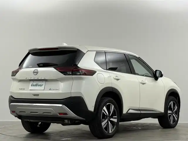 日産 エクストレイル G e－4ORCE 埼玉県 2024(令6)年 0.1万km ブリリアントホワイトパール 純正１２．３型ＤＡ　全方位　温シート　ＢＳＭ　ＨＵＤ　ＥＴＣ２．０　ＬＥＤ　プロパイロット　パーキングアシスト　パワーシート　パワーバックドア　ＡＣ１００V　ＢＴ　フルセグ　ダウンヒルアシスト　コネクトナビ