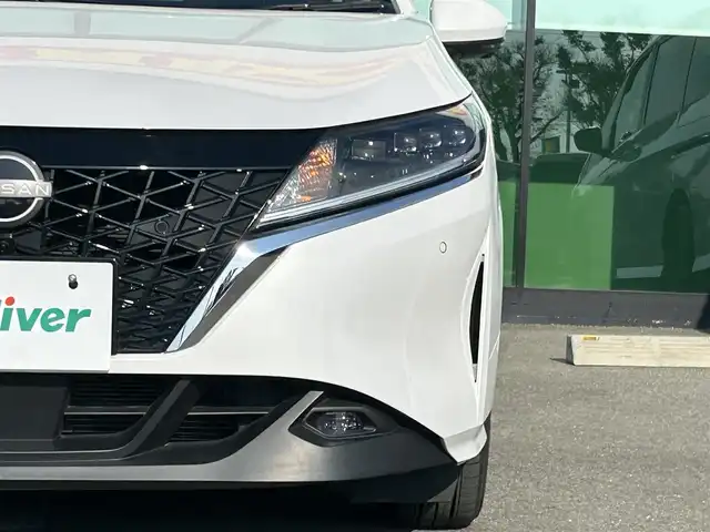日産 ノート X 和歌山県 2023(令5)年 2.9万km ピュアホワイトパール 純正9インチディスプレイオーディオ/Bluetooth/USB/アラウンドビューモニター/ビルトインETC/前後ドライブレコーダー/デジタルインナーミラー/衝突軽減カメラ/BSM/コーナーセンサー/ステアリングスイッチ/電動パーキングブレーキ/オートブレーキホールド/ドライブモードセレクト/LEDヘッドライト/フォグランプ/オートライト/オートハイビーム/純正16インチAW/ドアバイザー/純正フロアマット/プッシュスタート/スマートキー/取扱説明書