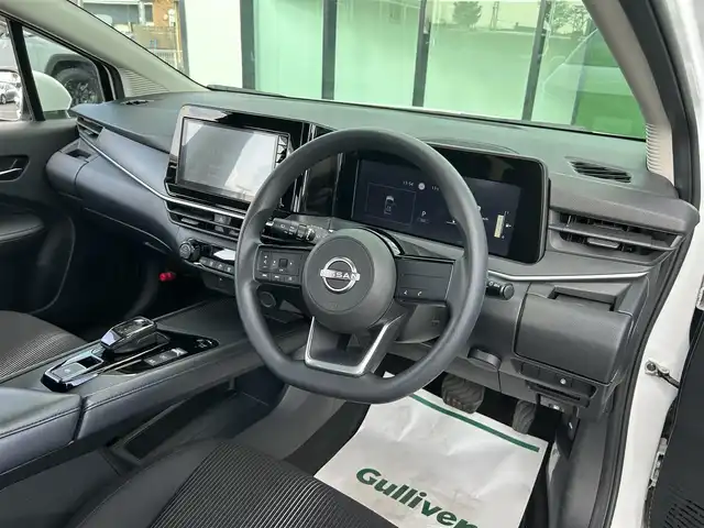 日産 ノート X 和歌山県 2023(令5)年 2.9万km ピュアホワイトパール 純正9インチディスプレイオーディオ/Bluetooth/USB/アラウンドビューモニター/ビルトインETC/前後ドライブレコーダー/デジタルインナーミラー/衝突軽減カメラ/BSM/コーナーセンサー/ステアリングスイッチ/電動パーキングブレーキ/オートブレーキホールド/ドライブモードセレクト/LEDヘッドライト/フォグランプ/オートライト/オートハイビーム/純正16インチAW/ドアバイザー/純正フロアマット/プッシュスタート/スマートキー/取扱説明書