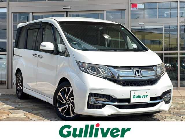 ホンダ ステップワゴン スパーダ クールスピリット 静岡県 2015(平27)年 6.9万km ホワイトオーキッドパール 純正SDナビ/・CD/・DVD/・フルセグＴＶ/・Bluetooth/・HDMI/・AM/・FM/主要装備/・両側パワスラ/・後席モニター/・ホンダセンシング/・衝突軽減/・レーンキープ/・追従クルコン/・コーナーセンサー前後/・バックカメラ/・ドラレコ前/・ビルトインＥＴＣ/・ハーフレザーシート/・シートヒーター/・ヒーテッドドアミラー/・パドルシフト/・純正フロアマット/・純正アルミホイール