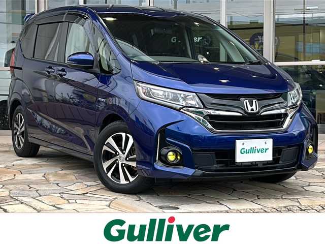 ホンダ フリード ハイブリット EX 静岡県 2017(平29)年 6.7万km コバルトブルーパール 純正SDナビ/・CD/・DVD/・フルセグＴＶ/・Bluetooth/・AM/・FM/主要装備/・モデューロFエアロ/・Rスポイラー/・両側パワスラ/・ホンダセンシング/・衝突軽減/・レーンキープ/・追従クルコン/・バックカメラ/・ETC/・ハーフレザーシート/・シートヒーター/・LEDヘッドライト/・オートライト/・LEDヘッドライト/・フォグランプ/・ヒーテッドドアミラー/・ステリモ/・スマートキー/・プッシュスタート