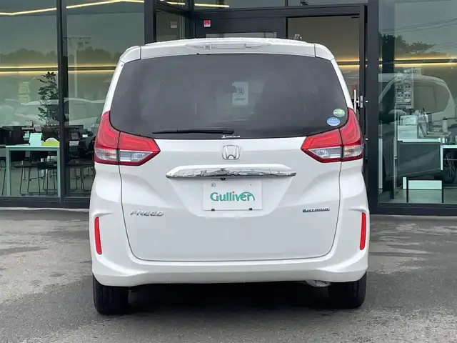ホンダ フリード ハイブリット EX 東京都 2018(平30)年 7.7万km ホワイトオーキッドパール Honda SENSING/・衝突軽減ブレーキ/・誤発進抑制機能/・路外逸脱抑制機能/・アダプティブクルーズコントロール/・車線維持支援システム/・先行車発進お知らせ機能/プッシュスタート/寒冷地/コンフォートビューパッケージ/純正9インチナビ/フルセグTV/バックカメラ/ビルトインETC/ドライブレコーダー/両側パワースライドドア/ハーフレザーシート/シートヒーター/後席ロールサンシェード/LEDヘッドライト/ドアバイザー/スマートキー/15インチ純正アルミホイール