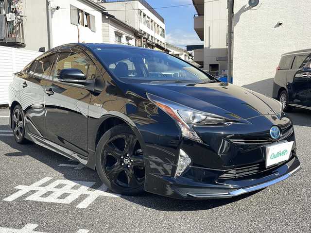 トヨタ プリウス S ツーリングセレクション 沖縄県 2017(平29)年 9.5万km アティチュードブラックマイカ /登録時走行距離/　　　　　　　95078キロ/社外ナビ/バックカメラ/地デジ/黒革シート/シートヒーター/PCS/モデリスタエアロ/ビルトインETC/新車時整備手帳/　　【保証書】/取扱説明書/