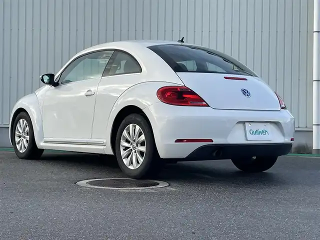 フォルクスワーゲン ザ・ビートル デザイン 富山県 2013(平25)年 7.5万km キャンディホワイト 〇純正ナビ/〇フルセグTV/〇ETC/〇横滑り防止装置/〇フロントフォグランプ/〇マニュアルエアコン/〇革巻きステアリングホイール/〇ブラックファブリックシート/〇純正16インチアルミホイール/〇リモコンキー/〇禁煙車