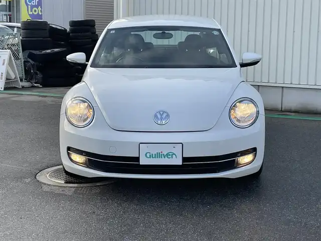フォルクスワーゲン ザ・ビートル デザイン 富山県 2013(平25)年 7.5万km キャンディホワイト 〇純正ナビ/〇フルセグTV/〇ETC/〇横滑り防止装置/〇フロントフォグランプ/〇マニュアルエアコン/〇革巻きステアリングホイール/〇ブラックファブリックシート/〇純正16インチアルミホイール/〇リモコンキー/〇禁煙車