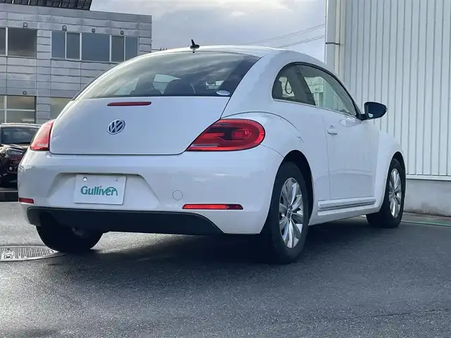 フォルクスワーゲン ザ・ビートル デザイン 富山県 2013(平25)年 7.5万km キャンディホワイト 〇純正ナビ/〇フルセグTV/〇ETC/〇横滑り防止装置/〇フロントフォグランプ/〇マニュアルエアコン/〇革巻きステアリングホイール/〇ブラックファブリックシート/〇純正16インチアルミホイール/〇リモコンキー/〇禁煙車