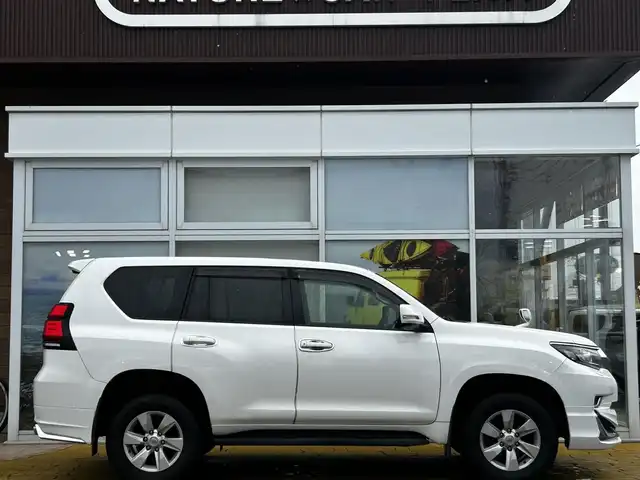 トヨタ ランドクルーザー プラド TX Lパッケージ 道北・旭川 2019(令1)年 8.1万km スーパーホワイトⅡ 純正9インチナビ/バックカメラ/フルセグTV/モデリスタエアロ/レザーシート/前席パワーシート/前席シートヒーター&クーラー/電動格納サードシート/LEDヘッドライト/プッシュスタート/スマートキー