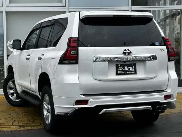 トヨタ ランドクルーザー プラド TX Lパッケージ 道北・旭川 2019(令1)年 8.1万km スーパーホワイトⅡ 純正9インチナビ/バックカメラ/フルセグTV/モデリスタエアロ/レザーシート/前席パワーシート/前席シートヒーター&クーラー/電動格納サードシート/LEDヘッドライト/プッシュスタート/スマートキー