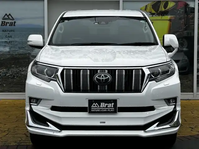 トヨタ ランドクルーザー プラド TX Lパッケージ 道北・旭川 2019(令1)年 8.1万km スーパーホワイトⅡ 純正9インチナビ/バックカメラ/フルセグTV/モデリスタエアロ/レザーシート/前席パワーシート/前席シートヒーター&クーラー/電動格納サードシート/LEDヘッドライト/プッシュスタート/スマートキー