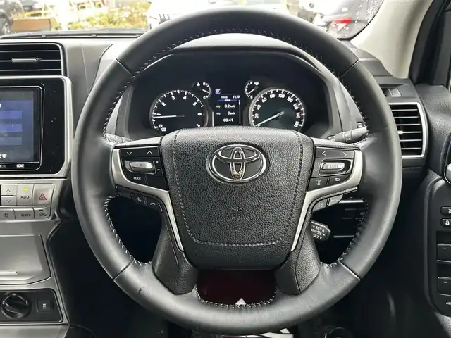 トヨタ ランドクルーザー プラド TX Lパッケージ 道北・旭川 2019(令1)年 8.1万km スーパーホワイトⅡ 純正9インチナビ/バックカメラ/フルセグTV/モデリスタエアロ/レザーシート/前席パワーシート/前席シートヒーター&クーラー/電動格納サードシート/LEDヘッドライト/プッシュスタート/スマートキー