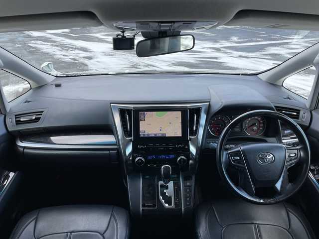 トヨタ ヴェルファイア Z 道央・札幌 2020(令2)年 14.6万km ホワイトパールクリスタルシャイン ４WD/ワンオーナー/純正Dオーディオ/CD/DVD/BT/フルセグ/トヨタセーフティセンス/プリクラッシュセーフティ/横滑り防止装置/レーダークルーズコントロール/レーンキープアシスト/パーキングアシスト/クリアランスソナー/パーキングサポートブレーキ/ロードサインアシスト/バックカメラ/ビルトインETC/ドライブレコーダー/アイドリングストップ/ECOMODE/両側パワースライドドア/レザーシートカバー/革巻きウッドコンビステアリング/ステアリングリモコン/AC100V/MTモード付AT/プッシュスタート/スマートキー/LEDヘッドライト/オートライト/オートマチックハイビーム/フォグランプ/電動格納ミラー/ウィンカーミラー/純正フロアマット/ドアバイザー/スペアキー