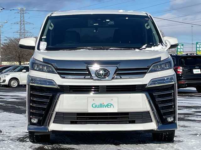 トヨタ ヴェルファイア Z 道央・札幌 2020(令2)年 14.6万km ホワイトパールクリスタルシャイン ４WD/ワンオーナー/純正Dオーディオ/CD/DVD/BT/フルセグ/トヨタセーフティセンス/プリクラッシュセーフティ/横滑り防止装置/レーダークルーズコントロール/レーンキープアシスト/パーキングアシスト/クリアランスソナー/パーキングサポートブレーキ/ロードサインアシスト/バックカメラ/ビルトインETC/ドライブレコーダー/アイドリングストップ/ECOMODE/両側パワースライドドア/レザーシートカバー/革巻きウッドコンビステアリング/ステアリングリモコン/AC100V/MTモード付AT/プッシュスタート/スマートキー/LEDヘッドライト/オートライト/オートマチックハイビーム/フォグランプ/電動格納ミラー/ウィンカーミラー/純正フロアマット/ドアバイザー/スペアキー
