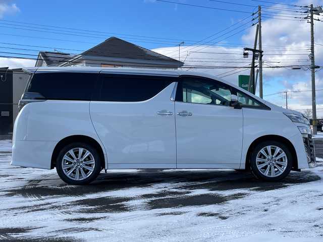 トヨタ ヴェルファイア Z 道央・札幌 2020(令2)年 14.6万km ホワイトパールクリスタルシャイン ４WD/ワンオーナー/純正Dオーディオ/CD/DVD/BT/フルセグ/トヨタセーフティセンス/プリクラッシュセーフティ/横滑り防止装置/レーダークルーズコントロール/レーンキープアシスト/パーキングアシスト/クリアランスソナー/パーキングサポートブレーキ/ロードサインアシスト/バックカメラ/ビルトインETC/ドライブレコーダー/アイドリングストップ/ECOMODE/両側パワースライドドア/レザーシートカバー/革巻きウッドコンビステアリング/ステアリングリモコン/AC100V/MTモード付AT/プッシュスタート/スマートキー/LEDヘッドライト/オートライト/オートマチックハイビーム/フォグランプ/電動格納ミラー/ウィンカーミラー/純正フロアマット/ドアバイザー/スペアキー