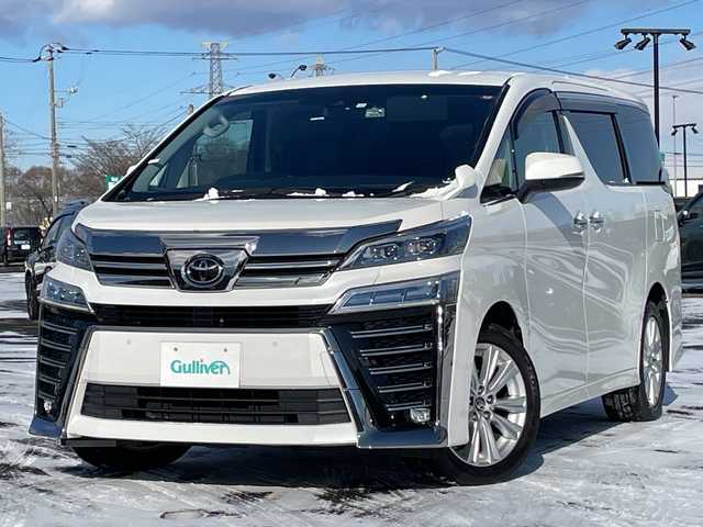 トヨタ ヴェルファイア Z 道央・札幌 2020(令2)年 14.6万km ホワイトパールクリスタルシャイン ４WD/ワンオーナー/純正Dオーディオ/CD/DVD/BT/フルセグ/トヨタセーフティセンス/プリクラッシュセーフティ/横滑り防止装置/レーダークルーズコントロール/レーンキープアシスト/パーキングアシスト/クリアランスソナー/パーキングサポートブレーキ/ロードサインアシスト/バックカメラ/ビルトインETC/ドライブレコーダー/アイドリングストップ/ECOMODE/両側パワースライドドア/レザーシートカバー/革巻きウッドコンビステアリング/ステアリングリモコン/AC100V/MTモード付AT/プッシュスタート/スマートキー/LEDヘッドライト/オートライト/オートマチックハイビーム/フォグランプ/電動格納ミラー/ウィンカーミラー/純正フロアマット/ドアバイザー/スペアキー