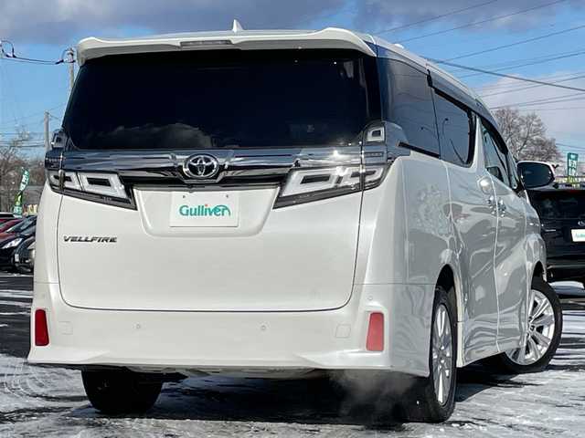 トヨタ ヴェルファイア Z 道央・札幌 2020(令2)年 14.6万km ホワイトパールクリスタルシャイン ４WD/ワンオーナー/純正Dオーディオ/CD/DVD/BT/フルセグ/トヨタセーフティセンス/プリクラッシュセーフティ/横滑り防止装置/レーダークルーズコントロール/レーンキープアシスト/パーキングアシスト/クリアランスソナー/パーキングサポートブレーキ/ロードサインアシスト/バックカメラ/ビルトインETC/ドライブレコーダー/アイドリングストップ/ECOMODE/両側パワースライドドア/レザーシートカバー/革巻きウッドコンビステアリング/ステアリングリモコン/AC100V/MTモード付AT/プッシュスタート/スマートキー/LEDヘッドライト/オートライト/オートマチックハイビーム/フォグランプ/電動格納ミラー/ウィンカーミラー/純正フロアマット/ドアバイザー/スペアキー