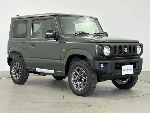 スズキ ジムニー XC 愛知県 2025(令7)年 0.1千km ジャングルグリーン 純正ディスプレイオーディオ/（Bluetooth/AM/FM/USB入力）/バックカメラ/シートヒーター/電動格納ミラー/フルフラット/LEDライト/ステアリングリモコン/ダウンヒルアシスト/コーナーセンサー/アダプティブクルーズコントロール/衝突軽減システム/純正AW