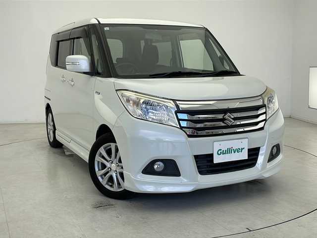 スズキ ソリオ HV MZ 千葉県 2017(平29)年 4.4万km ピュアホワイトP 横滑り防止装置/社外7インチSDナビ（CN-RE03WD）/　（Bluetooth/CD/DVD/フルセグTV）/社外ETC/アイドリングストップ/純正フロアマット/パワーステアリング/両側パワースライドドア/オートライト/キセノンヘッドライト/純正15インチアルミホイール