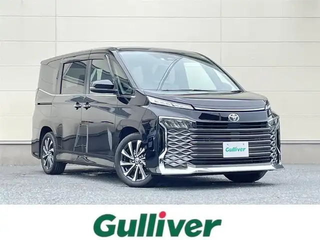 トヨタ ヴォクシー S－Z 茨城県 2022(令4)年 2.4万km アティチュードブラックマイカ 革巻きステアリング/10インチナビ機能付きDA/DVDプレイヤー/バックカメラ/純正ドライブレコーダー/両側パワースライドドア/ハーフレザーシート/シートヒーター/USB/HDMI/トヨタセーフティセンス/レーダークルーズコントロール/LEDヘッドライト/ETC