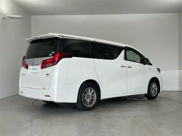 トヨタ アルファードハイブリット G Fパッケージ 埼玉県 2018(平30)年 3.5万km ホワイトパールクリスタルシャイン ４WD/純正メーカーオプションナビ/CD/DVD/Bluetooth/フルセグ/後席用フリップダウンモニター/デジタルインナーミラー/パノラミックビューモニター/トヨタセーフティセンス/・プリクラッシュセーフティ/・レーントレーシングアシスト/・レーダークルーズコントロール/・ロードサインアシスト/・オートマチックハイビーム/ブラインドスポットモニター/先行車発進告知/ビルトインETC2.0/パワーバックドア/レザーシート/前席パワーシート/前席シートヒーター/エアシート/純正17インチAW/オートライト/２限LEDヘッドライト/社外AW付きスタッドレスタイヤ４本積込