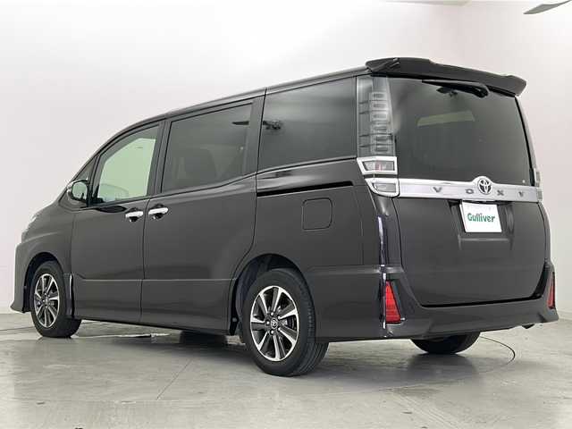 トヨタ ヴォクシー ZS 煌 宮城県 2018(平30)年 7.1万km ボルドーマイカメタリック Toyota Safety Sense /・プリクラッシュセーフティ/・レーンディパーチャーアラート/・オートマチックハイビーム/クルーズコントロール/純正10インチSDナビ/・BT.CD.DVD.USB.SD.HDMI/バックカメラ/フルセグTV/両側パワースライドドア/純正12.1インチフリップダウンモニター/ドライブレコーダー（F）/ビルトインETC/ステアリングスイッチ/LEDヘッドライト/LEDフォグライト/プッシュスタート/スマートキー/アイドリングストップ/社外フロアマット/純正16インチAW/ロールサンシェード/シートバックテーブル