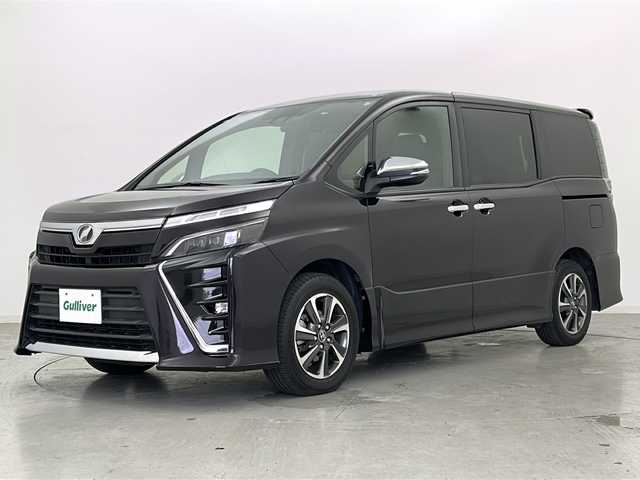 トヨタ ヴォクシー ZS 煌 宮城県 2018(平30)年 7.1万km ボルドーマイカメタリック Toyota Safety Sense /・プリクラッシュセーフティ/・レーンディパーチャーアラート/・オートマチックハイビーム/クルーズコントロール/純正10インチSDナビ/・BT.CD.DVD.USB.SD.HDMI/バックカメラ/フルセグTV/両側パワースライドドア/純正12.1インチフリップダウンモニター/ドライブレコーダー（F）/ビルトインETC/ステアリングスイッチ/LEDヘッドライト/LEDフォグライト/プッシュスタート/スマートキー/アイドリングストップ/社外フロアマット/純正16インチAW/ロールサンシェード/シートバックテーブル