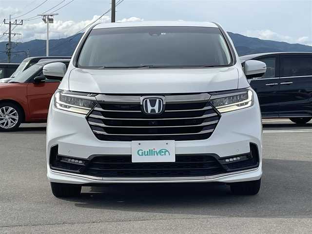 ホンダ オデッセイ アブソルート EX 熊本県 2022(令4)年 4万km パール 純正10インチナビ（VXU-227DYi）/・フルセグTV/Bluetooth/DVD/CD/HDMI/純正12.8型フリップダウンモニター/全周囲カメラ/両側パワースライドドア/パワーテールゲート/シートヒーター/純正前後ドライブレコーダー/前後コーナーセンサー/ビルトインETC2.0/純正18インチアルミホイール/純正フロアマット/純正ドアバイザー/ホンダセンシング/・標識認識システム/・CMBS（衝突軽減システム）/・ACC先行車検知音/・先行車発信警報/・路外逸脱抑制システム/・レーンキープアシストシステム/・ブラインドスポットシステム