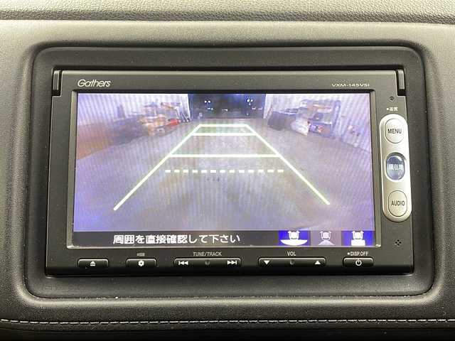 ホンダ ヴェゼル ハイブリッド X 栃木県 2014(平26)年 8.6万km ホワイトオーキッドパール 禁煙車/純正ナビ/（CD/DVD/BT/TV/AM/FM/SD)/オートライト/LEDヘッドライト/オートエアコン/電子パーキングブレーキ/オートホールド/ETC/電動格納ミラー/サイドバイザー/純正フロアマット/スマートキー/プッシュスタート/クルーズコントロール/フォグライト/革巻きステアリング/ステアリングスイッチ/パドルシフト