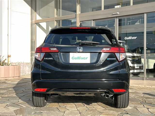 ホンダ ヴェゼル ハイブリッド Z ホンダセンシング 静岡県 2018(平30)年 7.2万km クリスタルブラックパール 社外ナビ（AM FM DTV Bluetooth SD DVD フルセグ USB ipod）/バックカメラ/アダプティブクルーズコントロール/ハーフレザーシート/シートヒーターD＋N席/チップアップシート/ドライブレコーダー/ヒーテッドドアミラー/ステアリングリモコンアダプター/ブレーキホールド/ETC/純正アルミホイール/社外フロアマット/LEDヘッドライト/フォグランプ/Wエアバッグ/カーテンエアバッグ/スマートキー/スペアキー×１/取扱説明書/保証書