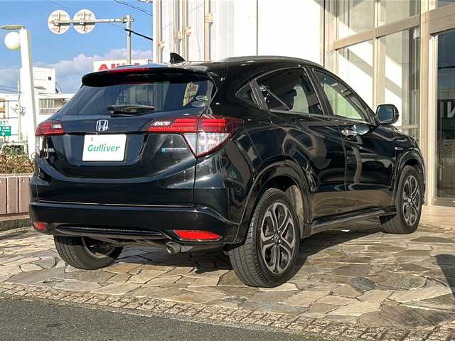 ホンダ ヴェゼル ハイブリッド Z ホンダセンシング 静岡県 2018(平30)年 7.2万km クリスタルブラックパール 社外ナビ（AM FM DTV Bluetooth SD DVD フルセグ USB ipod）/バックカメラ/アダプティブクルーズコントロール/ハーフレザーシート/シートヒーターD＋N席/チップアップシート/ドライブレコーダー/ヒーテッドドアミラー/ステアリングリモコンアダプター/ブレーキホールド/ETC/純正アルミホイール/社外フロアマット/LEDヘッドライト/フォグランプ/Wエアバッグ/カーテンエアバッグ/スマートキー/スペアキー×１/取扱説明書/保証書