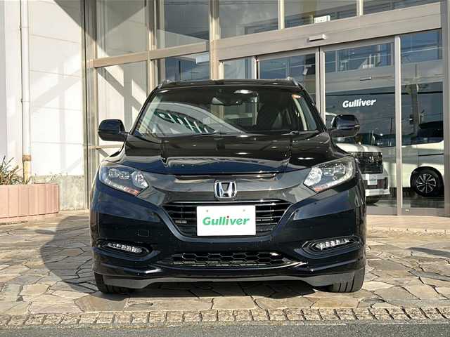 ホンダ ヴェゼル ハイブリッド Z ホンダセンシング 静岡県 2018(平30)年 7.2万km クリスタルブラックパール 社外ナビ（AM FM DTV Bluetooth SD DVD フルセグ USB ipod）/バックカメラ/アダプティブクルーズコントロール/ハーフレザーシート/シートヒーターD＋N席/チップアップシート/ドライブレコーダー/ヒーテッドドアミラー/ステアリングリモコンアダプター/ブレーキホールド/ETC/純正アルミホイール/社外フロアマット/LEDヘッドライト/フォグランプ/Wエアバッグ/カーテンエアバッグ/スマートキー/スペアキー×１/取扱説明書/保証書