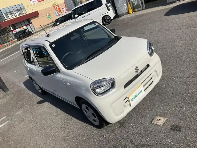 スズキ アルト L 滋賀県 2022(令4)年 1.4万km ソフトベージュメタリック ワンオーナー/車検9年8月まで/スズキセーフティサポート/アップグレードパッケージ/LEDヘッドライト/前席シートヒーター/オートエアコン/クラリオンCD/USBプレーヤー/ブラックドアミラー/リモコンキー/純正フロアマット/スペアキー有り/取扱説明書/保証書