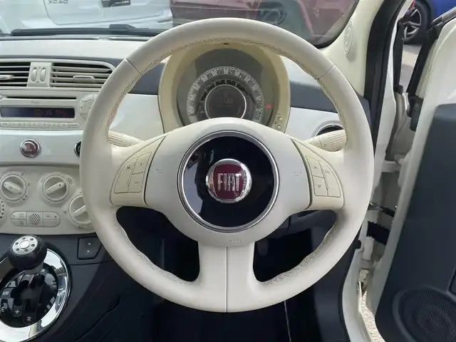 フィアット ５００ 1．2 ポップ 福岡県 2010(平22)年 8.4万km ボサノバホワイト ・社外ETC/・純正17AW/・保証書/・取扱説明書/・ハロゲンランプ/・リモコンキー/・MP3/・CDプレイヤー/・MTモード付AT/・シートカバー