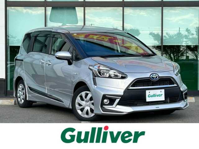 トヨタ シエンタ ハイブリッド G 和歌山県 2018(平30)年 2.3万km シルバーM ECLIPSE7インチナビ/フルセグTV/Bluetooth/CD/USB/SD/バックカメラ/ビルトインETC/ドライブレコーダー/衝突軽減カメラ/車線逸脱防止機能/両側パワースライドドア/モデリスタエアロ（F、S、R）/革巻きステアリング/ステアリングスイッチ/オートマチックハイビーム/ヘッドライトレベライザー/電格ミラー/フルオートエアコン/プッシュスタート/スマートキー
